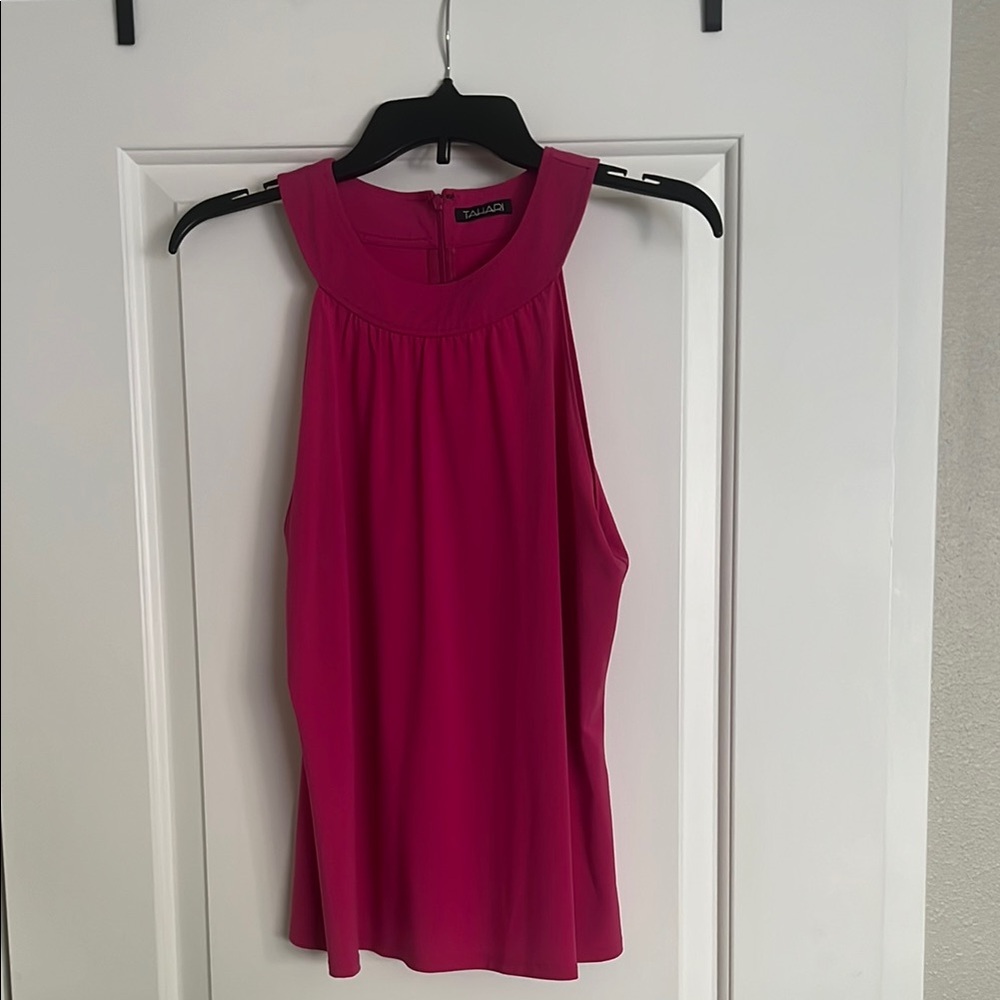 Sleeveless, hot pink top. Like new—worn once.